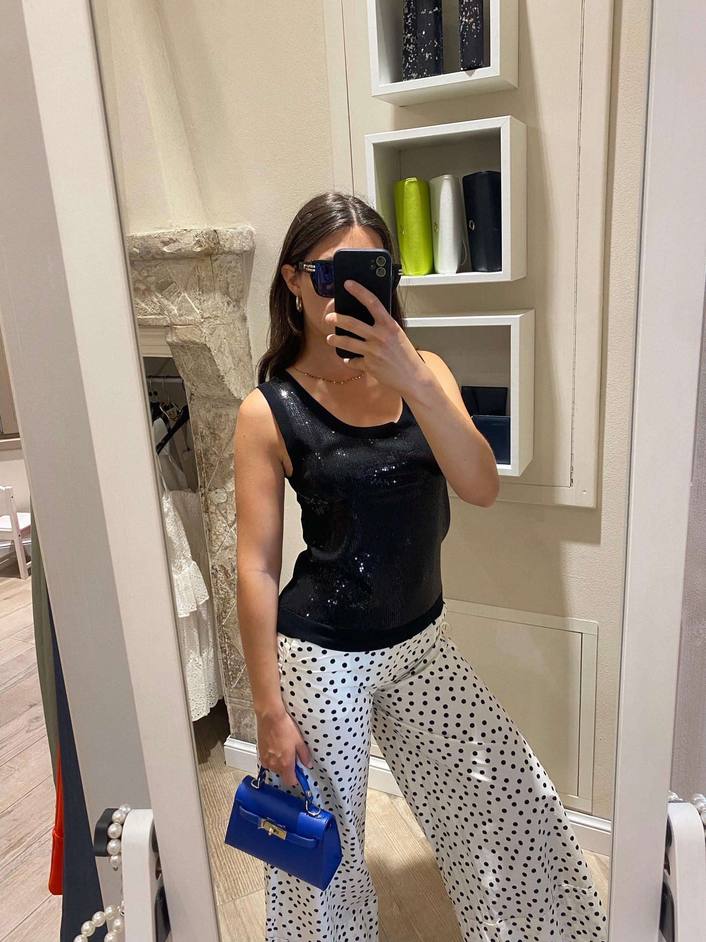 Pantaloni a pois bianchi