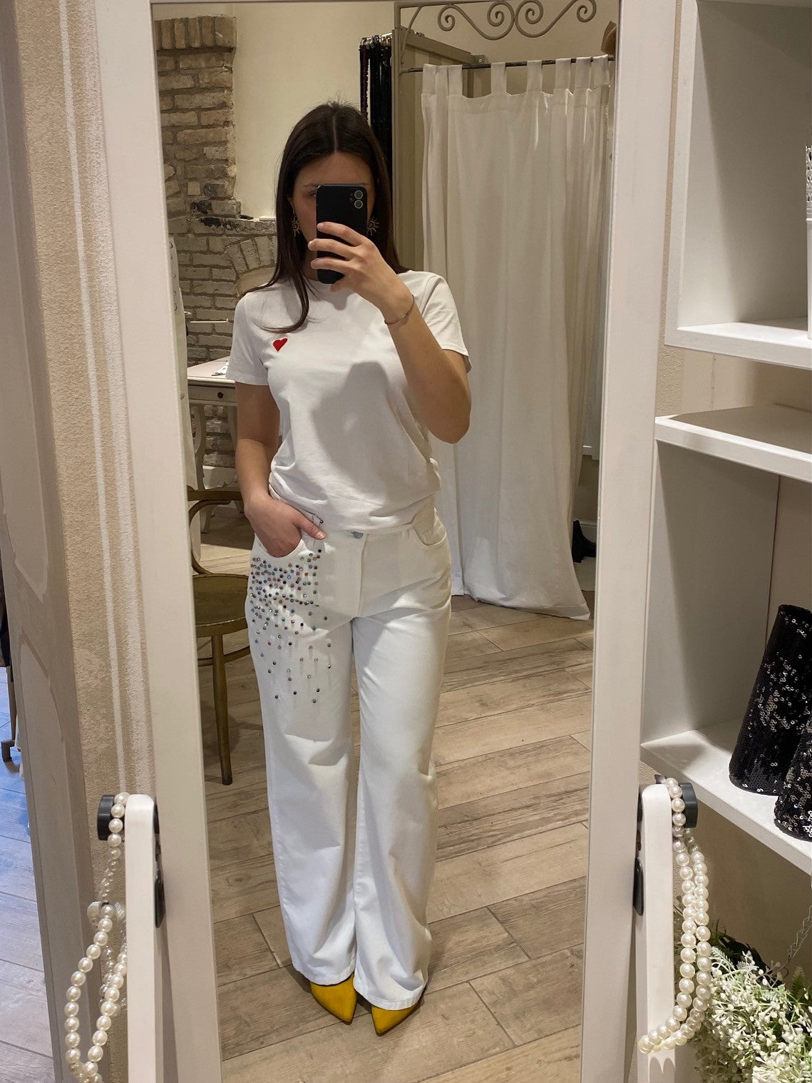 Jeans bianco con applicazioni
