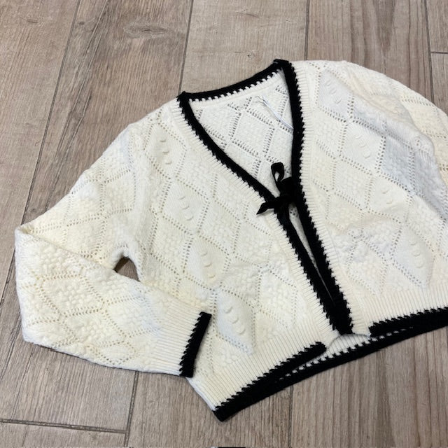 cardigan corto con fiocco